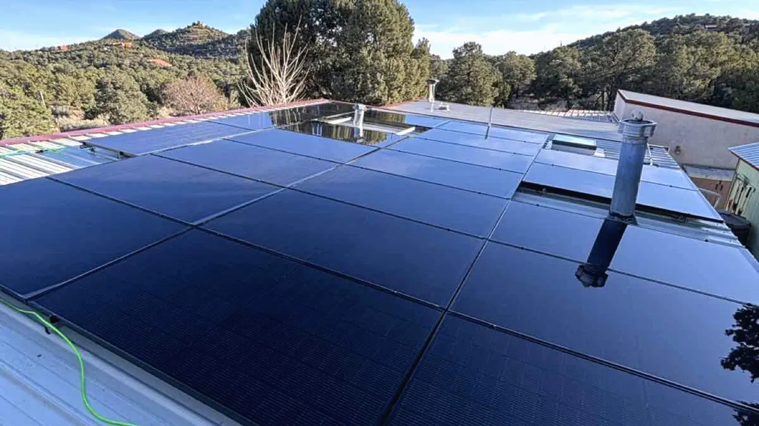 Solar panels reflecting the New Mexico sky.